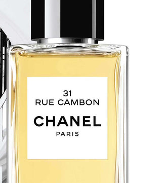 Chanel perfume bottle with '31 Rue Cambon' label against a white background