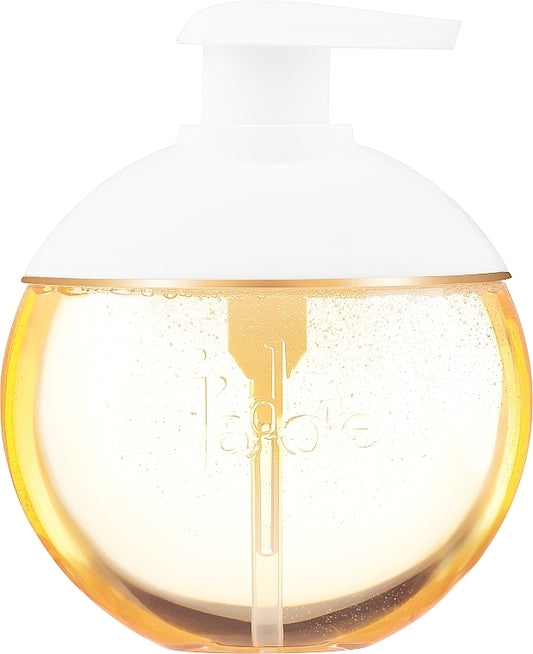 Perfume bottle with white cap and gold body on a white background