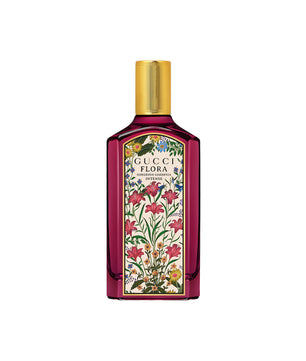 Gucci Flora perfume bottle with floral design on a white background