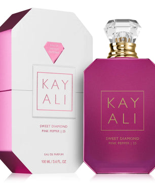 Two perfume bottles by KAY ALI, one white and one purple, on a white background.