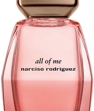 Narciso Rodriguez 'All of Me' perfume bottle with pink body and gold cap on a white background