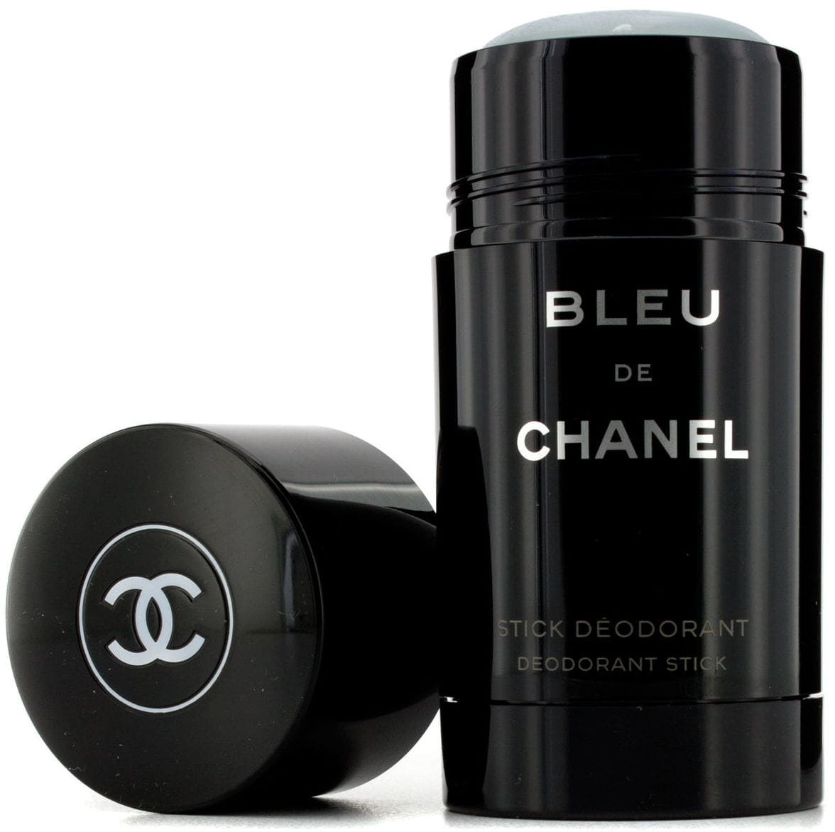 Chanel Bleu de Chanel stick deodorant in a glossy black cylindrical container, shown with the cap removed and placed beside it on a white background.