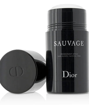 Dior Sauvage Deodorant Stick in a glossy black cylindrical container with the cap removed and placed beside it on a white background.