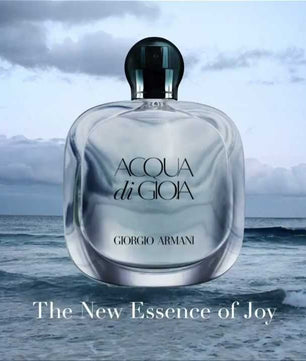 Perfume bottle with 'Acqua di Gioia' on a background of ocean waves and cloudy sky