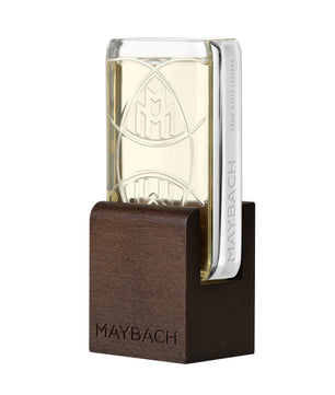 Maybach glass with wooden base on a white background