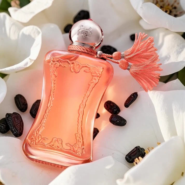 Perfume bottle with decorative elements on a floral background