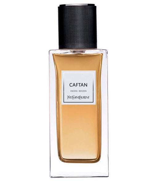 Perfume bottle labeled 'Caftan' by Yves Saint Laurent on a white background