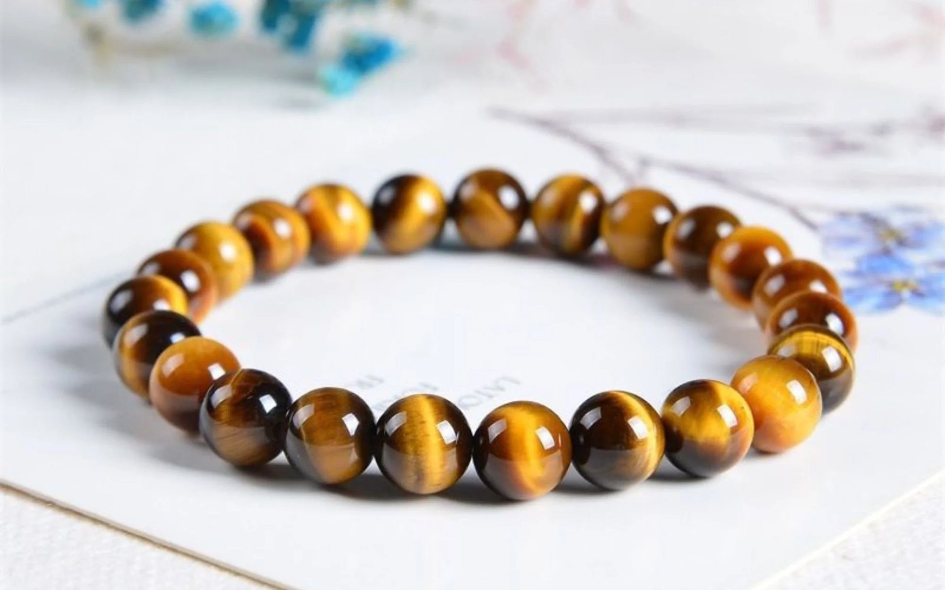 Tiger eye beaded bracelet on a white surface