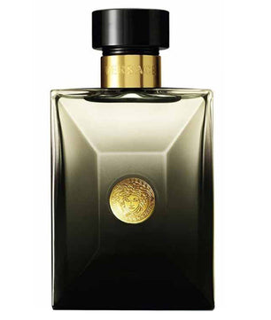 Versace perfume bottle with gold cap and emblem on a white background