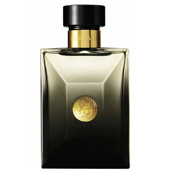 Versace perfume bottle with gold cap and emblem on a white background