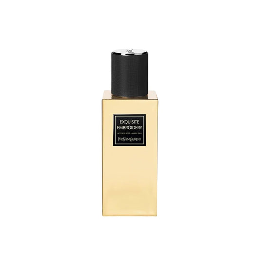 Perfume bottle labeled 'Exquisite Embroidery' by Yves Saint Laurent on a white background